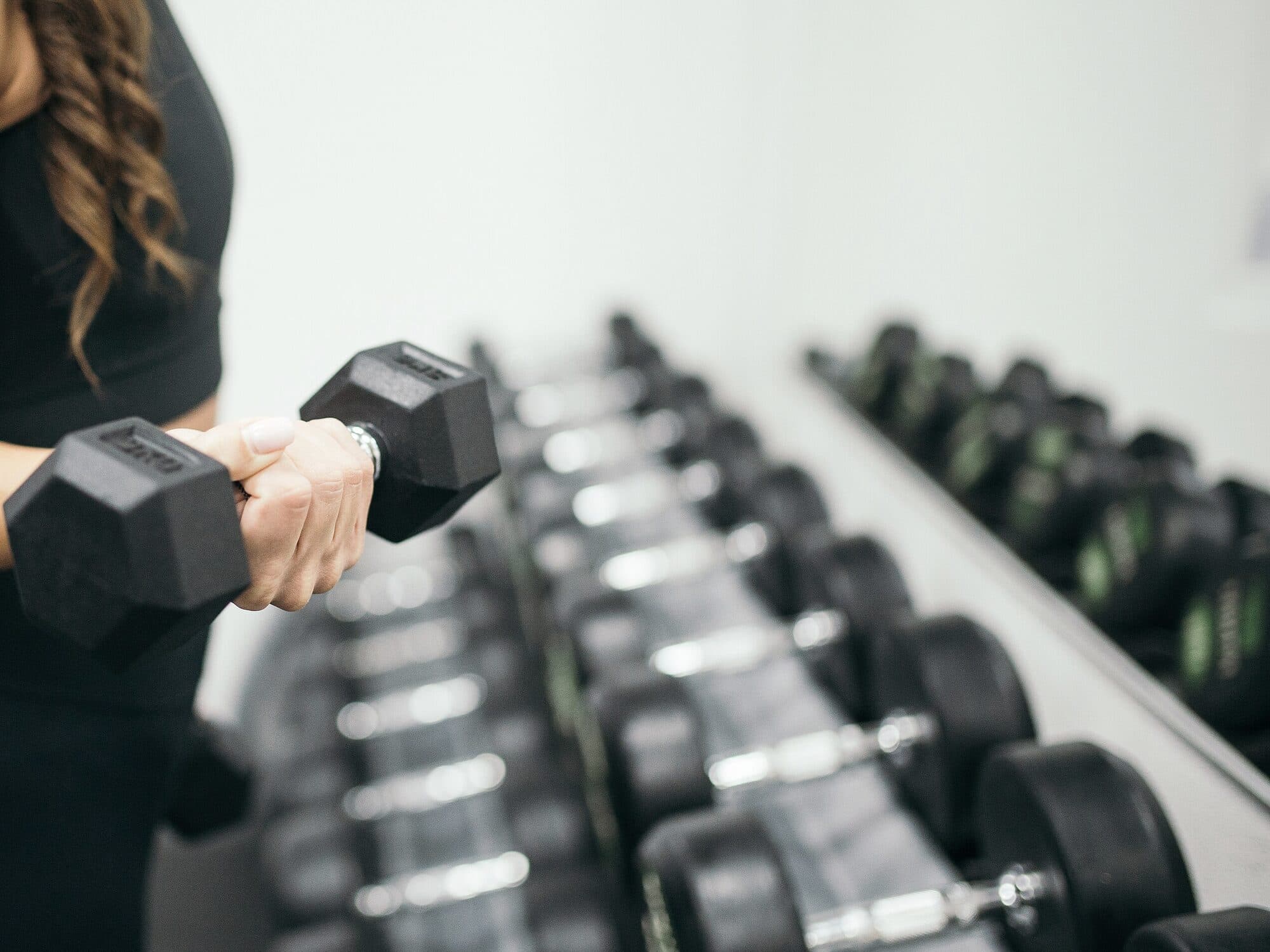 A rack of dumbbells in a gym